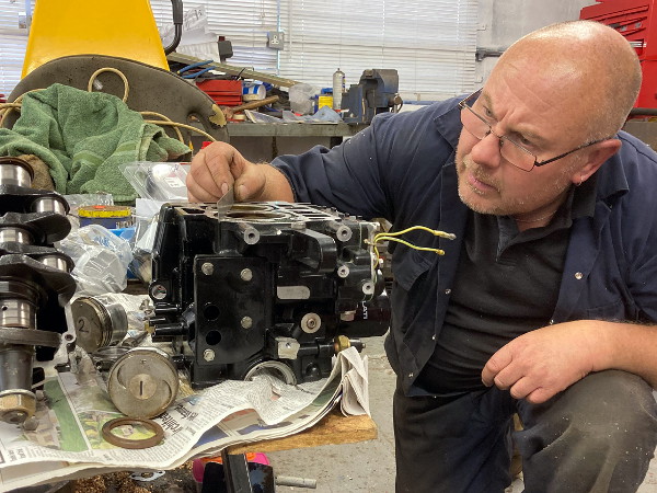 An engine block being measured